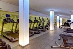 Fitness center with treadmills at the Hilton Frankfurt Airport.