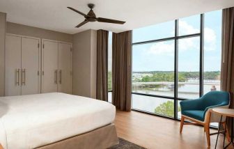 beautiful king room with water views at Homewood Suites by Hilton Wilmington Downtown.