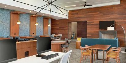 dedicated work station and business center with PC, work desk, internet, and printers at Homewood Suites by Hilton Wilmington Downtown.