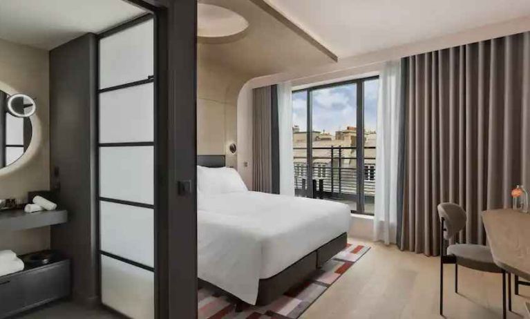 Bright balcony with desk at the Canopy by Hilton Paris Trocadero.