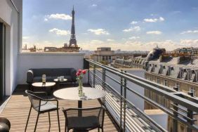 Hotel balcony overlooking the tour eiffel at the Canopy by Hilton Paris Trocadero.