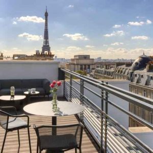 Hotel balcony overlooking the tour eiffel at the Canopy by Hilton Paris Trocadero.