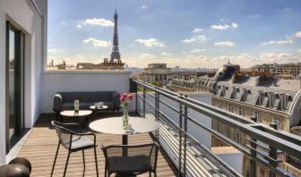 Hotel balcony overlooking the tour eiffel at the Canopy by Hilton Paris Trocadero.