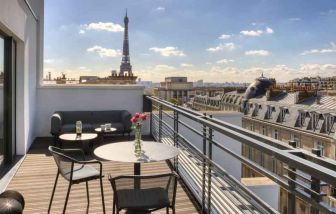 Hotel balcony overlooking the tour eiffel at the Canopy by Hilton Paris Trocadero.