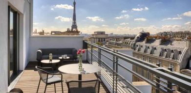 Hotel balcony overlooking the tour eiffel at the Canopy by Hilton Paris Trocadero.