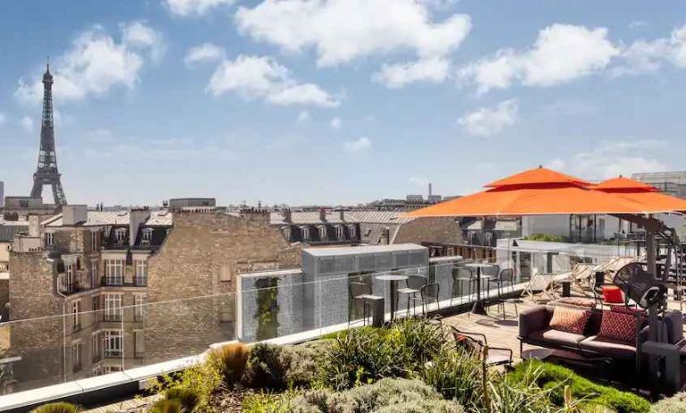 Beautiful outdoor terrace overlooking the city and the tour eiffel at the Canopy by Hilton Paris Trocadero.