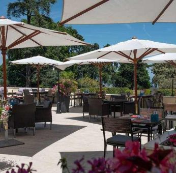 Outdoor patio perfect for co-working at the Hilton Evian-les-Bains.