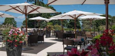 Outdoor patio perfect for co-working at the Hilton Evian-les-Bains.