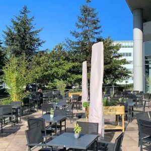 Outdoor patio perfect for co-working at the Hilton Paris Charles de Gaulle Airport.