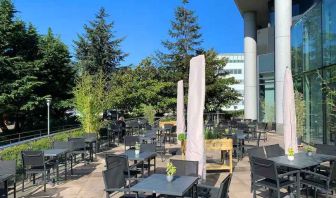 Outdoor patio perfect for co-working at the Hilton Paris Charles de Gaulle Airport.