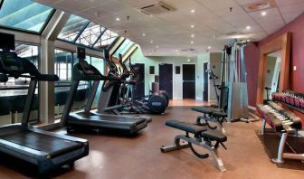 Fully equipped fitness center at the Hilton Paris La Defense.