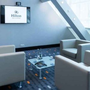 Hotel workspace with TV screen at the Hilton Paris La Defense.