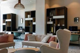 Comfortable lobby workspace at the Hilton Garden Inn Bordeaux Centre.