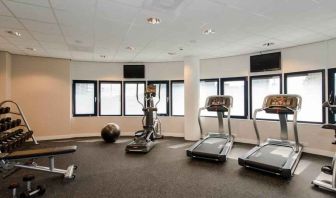 Fitness center with treadmill and machines at the Hampton by Hilton Amsterdam Airport Schiphol.