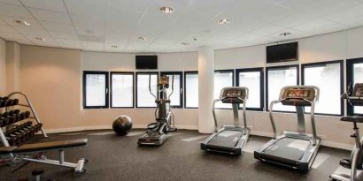 Fitness center with treadmill and machines at the Hampton by Hilton Amsterdam Airport Schiphol.