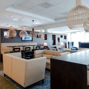 Comfortable lobby workspace at the Hampton by Hilton Amsterdam Airport Schiphol.