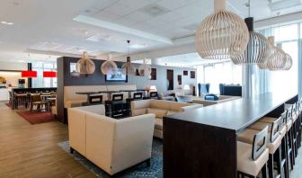 Comfortable lobby workspace at the Hampton by Hilton Amsterdam Airport Schiphol.