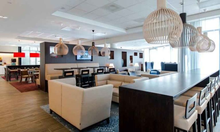 Comfortable lobby workspace at the Hampton by Hilton Amsterdam Airport Schiphol.