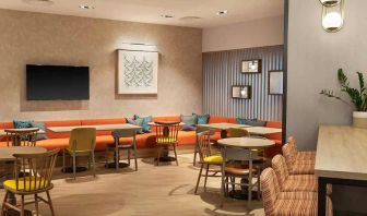 spacious lounge and lobby area ideal as a coworking space at Hampton by Hilton Torquay.