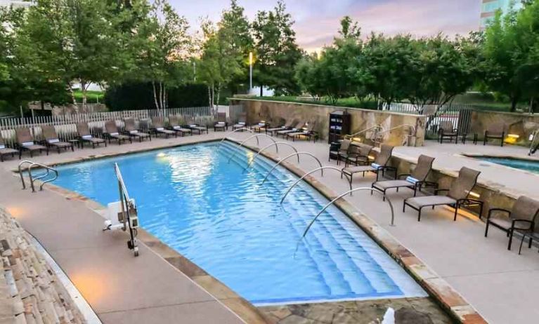 Relaxing outdoor pool at the Hilton Dallas Plano Granite Park.