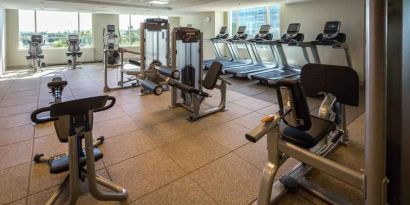 Fully equipped fitness center at the Hilton Dallas Plano Granite Park.