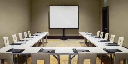 Meeting room with u shape table at the Hilton Dallas Plano Granite Park.