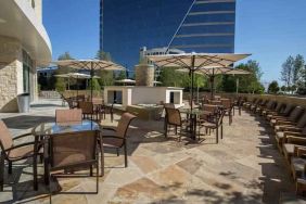 Beautiful outdoor terrace perfect as workspace at the Hilton Dallas Plano Granite Park.