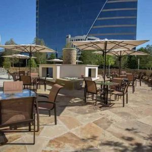 Beautiful outdoor terrace perfect as workspace at the Hilton Dallas Plano Granite Park.