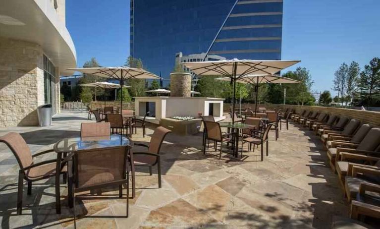 Beautiful outdoor terrace perfect as workspace at the Hilton Dallas Plano Granite Park.