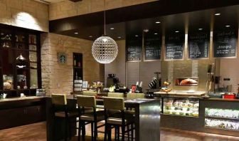 Dining area perfect for co-working at the Hilton Dallas Plano Granite Park.