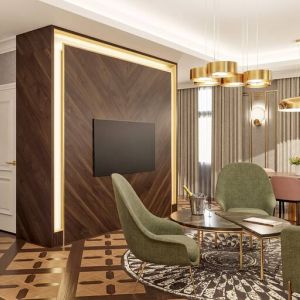 Living room with table, chairs and sofa at the Hotel Saski Krakow Curio Collection by Hilton.