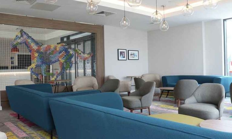 comfortable lobby area ideal for coworking and working remotely at Hampton by Hilton Hamilton Park.