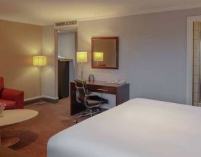 spacious king room with work desk and lounge area at DoubleTree by Hilton Bristol City Centre.