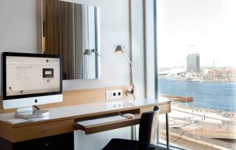 Working station overlooking the canals at the DoubleTree by Hilton Amsterdam Centraal Station.