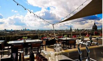 Beautiful outdoor terrace overlooking the city at the DoubleTree by Hilton Amsterdam Centraal Station.