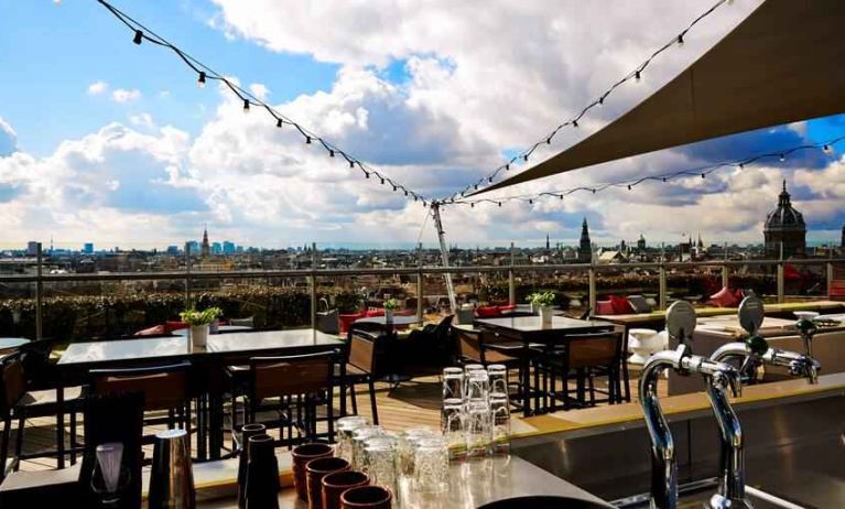 Beautiful outdoor terrace overlooking the city at the DoubleTree by Hilton Amsterdam Centraal Station.