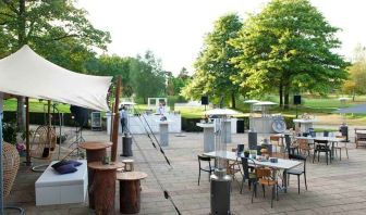 Outdoor patio perfect for co-working at the DoubleTree by Hilton Royal Parc Soestduinen.