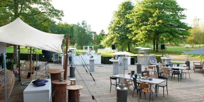 Outdoor patio perfect for co-working at the DoubleTree by Hilton Royal Parc Soestduinen.