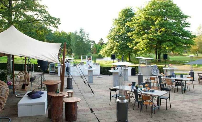 Outdoor patio perfect for co-working at the DoubleTree by Hilton Royal Parc Soestduinen.