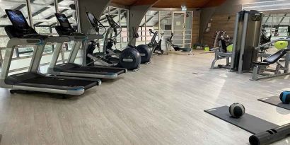 well equipped fitness center at Hilton Cobham.