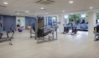 Well equipped fitness center at Hilton London Watford.