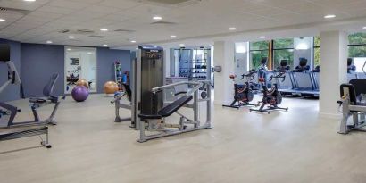 Well equipped fitness center at Hilton London Watford.