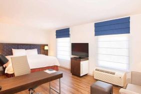 comfortable delux king room with work area ideal for working remotely at Hampton Inn & Suites by Hilton San Jose-Airport.