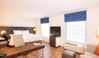 comfortable delux king room with work area ideal for working remotely at Hampton Inn & Suites by Hilton San Jose-Airport.