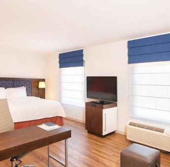 comfortable delux king room with work area ideal for working remotely at Hampton Inn & Suites by Hilton San Jose-Airport.