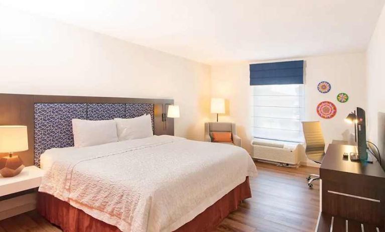 spacious king room with TV and work desk ideal to work remotely at Hampton Inn & Suites by Hilton San Jose-Airport.