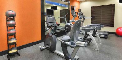 well equipped fitness center at Hampton Inn & Suites by Hilton San Jose-Airport.