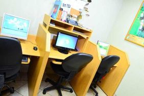 dedicated business center with PC, internet, business desk, and printer at Hampton Inn & Suites by Hilton San Jose-Airport.