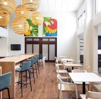 comfortable lobby and coworking space at Hampton Inn & Suites by Hilton San Jose-Airport.