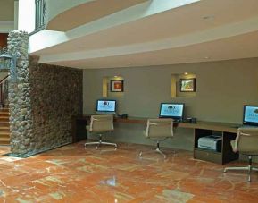dedicated business center with PC, internet, work desk, and printer ideal for working remotely at DoubleTree by Hilton Hotel Cariari San Jose - Costa Rica.